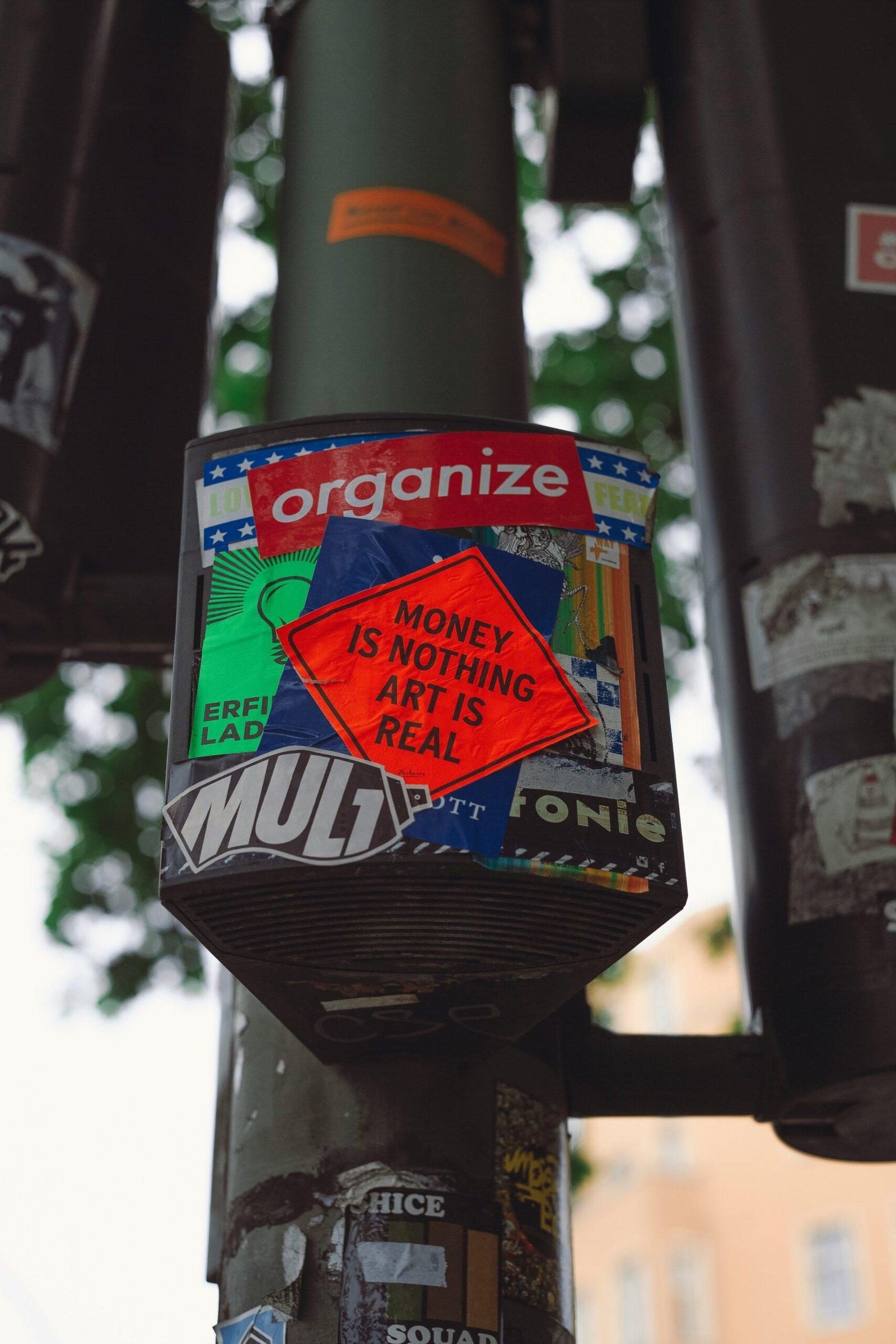 red and blue stickers on pole